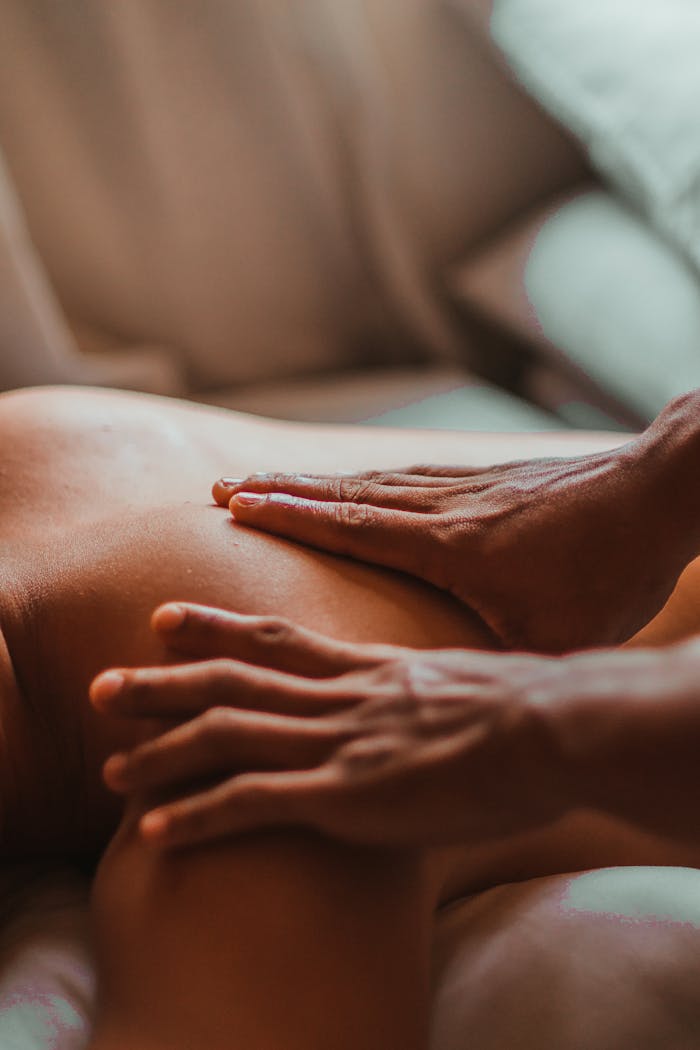 service-02 A soothing back massage session in a spa setting, focusing on wellness and relaxation.